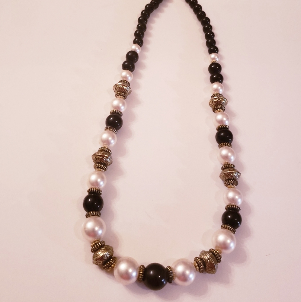 24 inch black and white beaded necklace.